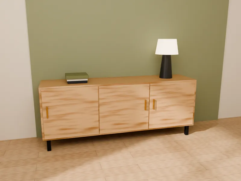 An oak sideboard with a table lamp and books